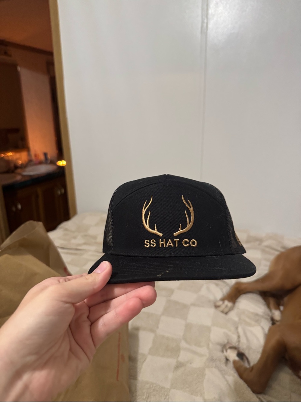 SS Hat Co Black Trucker Hat with Gold Antler Logo